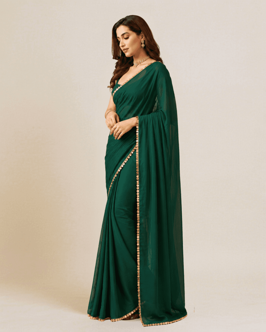 Emerald-green georgette saree, side profile showing the gold sequin border