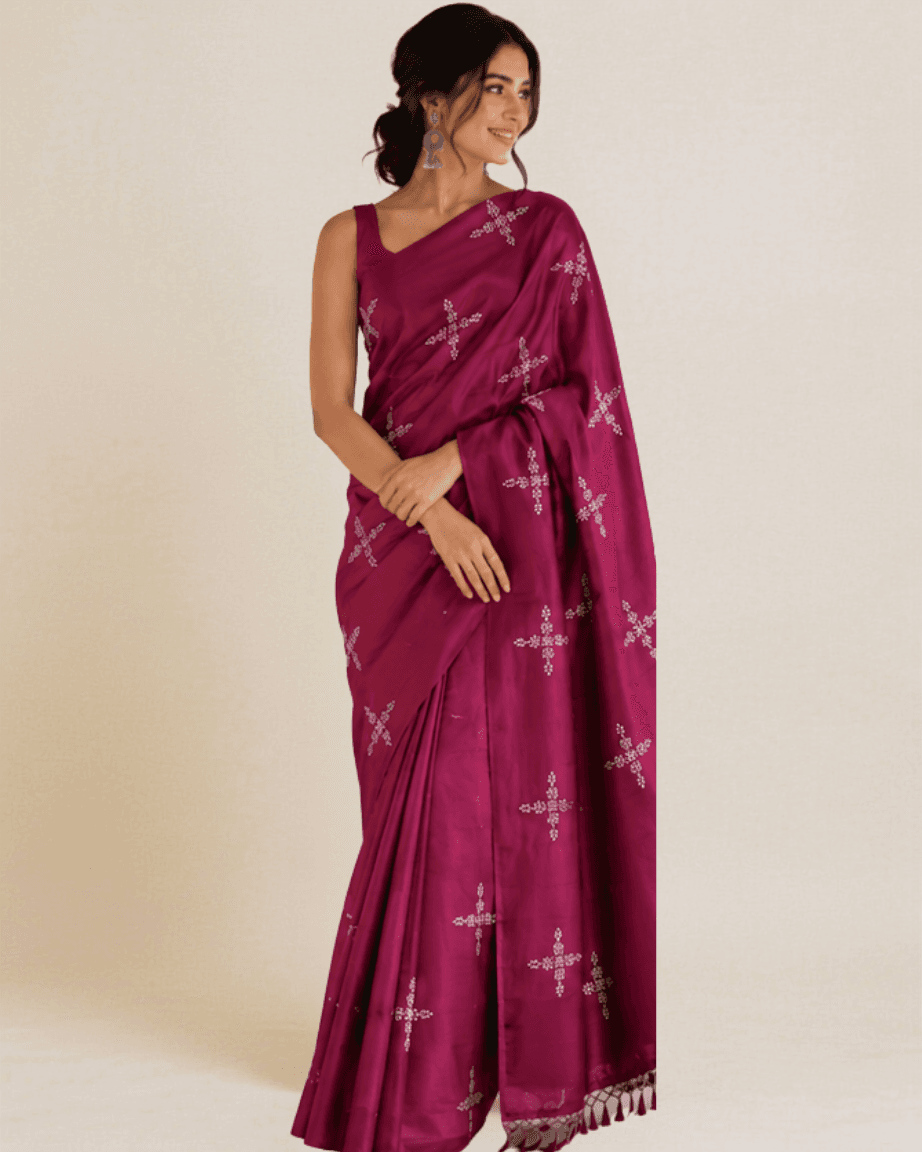 Magenta silk-cotton saree, side view showing the sequin-embroidered pallu drape