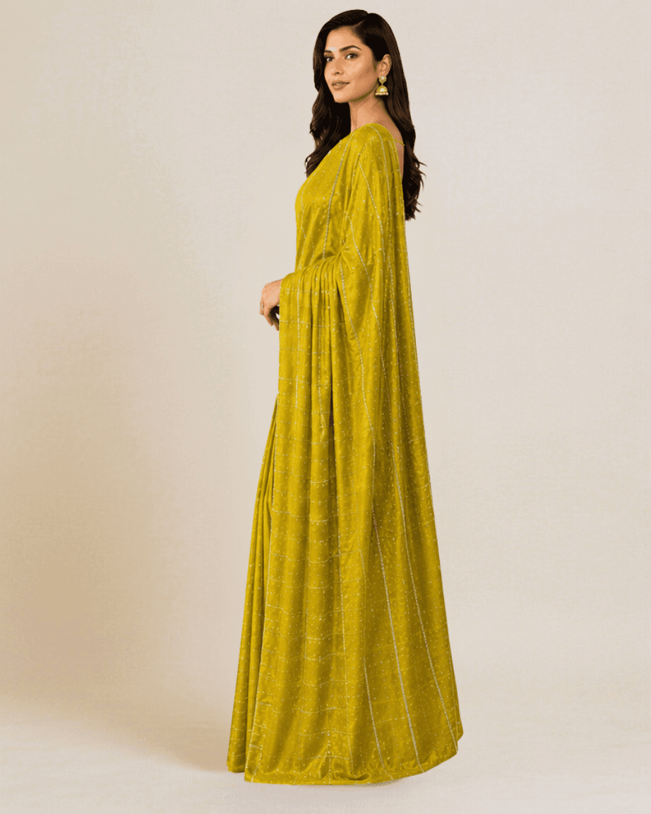 Mehendi-green satin saree, side profile showing the sequin pinstripe pallu