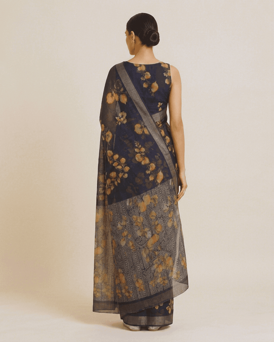 Midnight-navy watercolour leaf-print georgette saree, back view