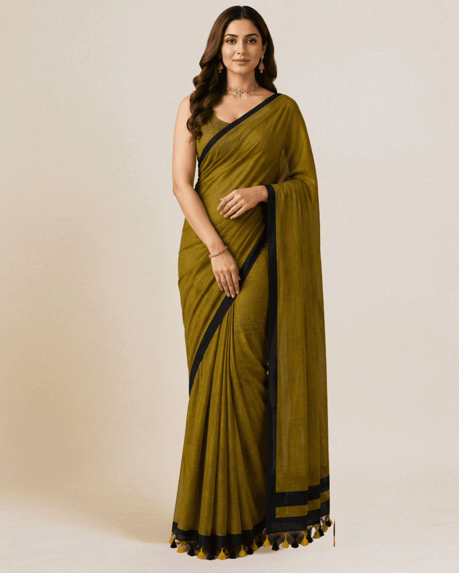 Model wearing an olive linen-blend saree with a black satin border and tassel edge, front view