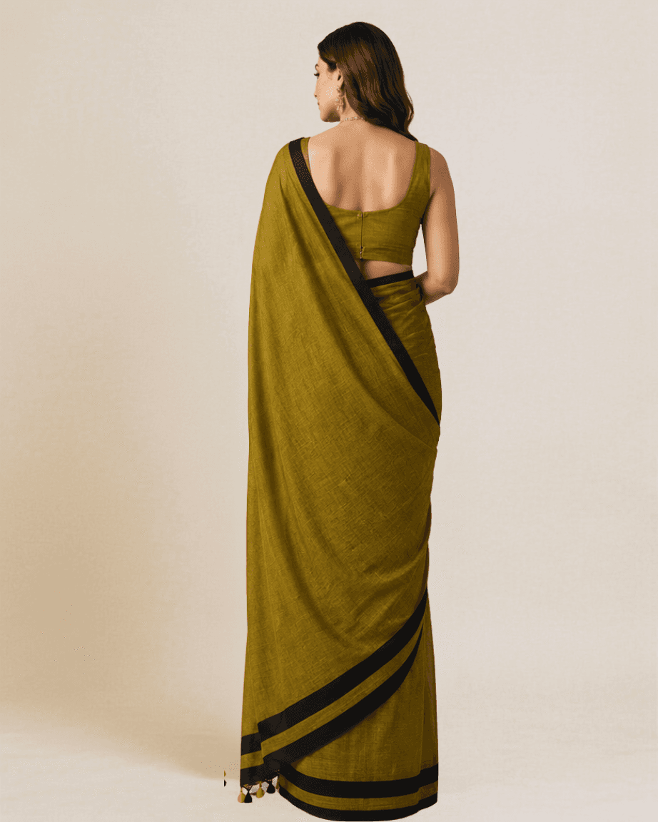 Olive linen-blend saree, back view with the black-and-gold tassel edge