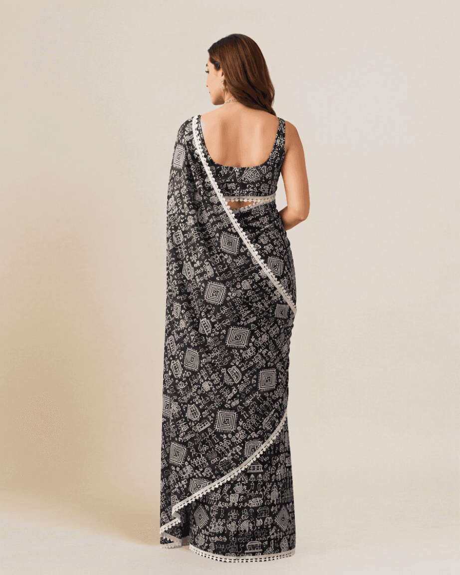 Jet-black Warli-print georgette saree, back view