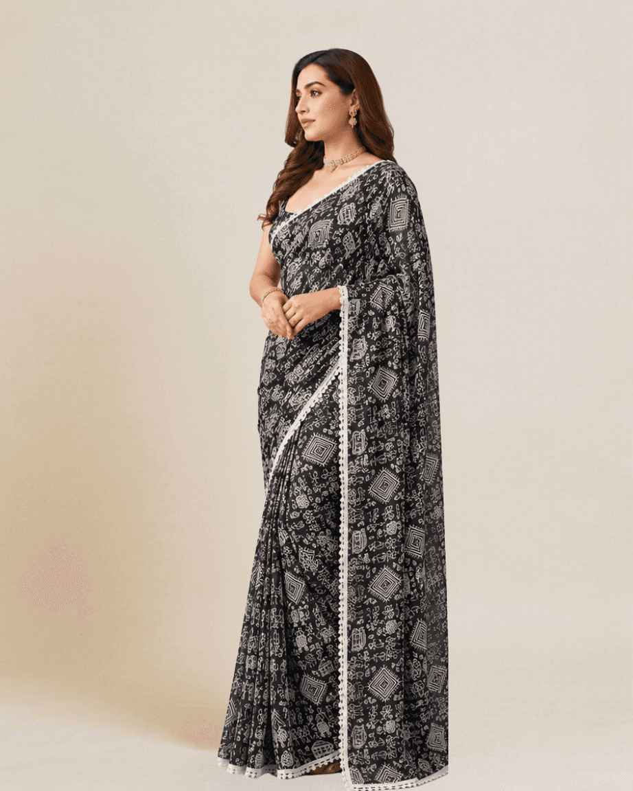Jet-black Warli-print georgette saree, alternate side profile